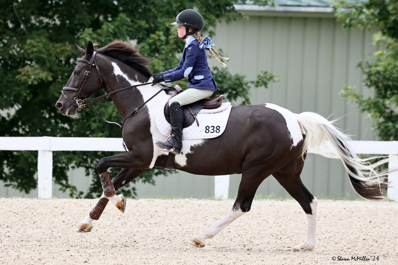 Young girl on paint horse